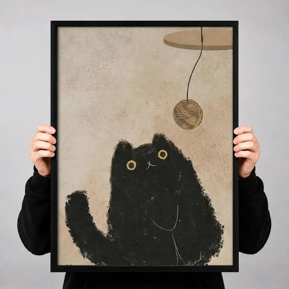 Fluffy Black Cat under Hanging Toy Wall Art 3